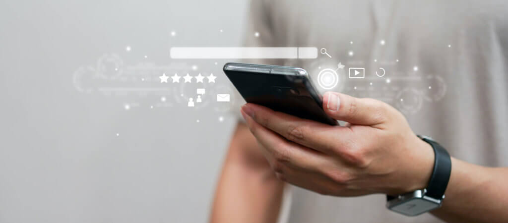 close up man hand touchscreen on smartphone to use search engine optimization (SEO) tools for find customer or promote and advertise about content online for marketing technology and business concept close up man hand touchscreen on smartphone to use search engine optimization (SEO) tools for find customer or promote and advertise about content online for marketing technology